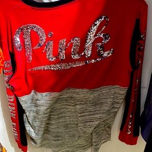 Women’s size large, Victoria’s Secret pink shirt